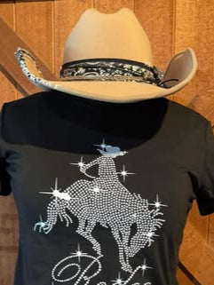 Cream-colored western hat with a wide brim and black embroidered band.