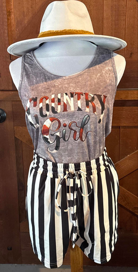 Washed grey sleeveless tank top featuring the words "Country Girl" in bold lettering with a cowhide-style graphic fill.