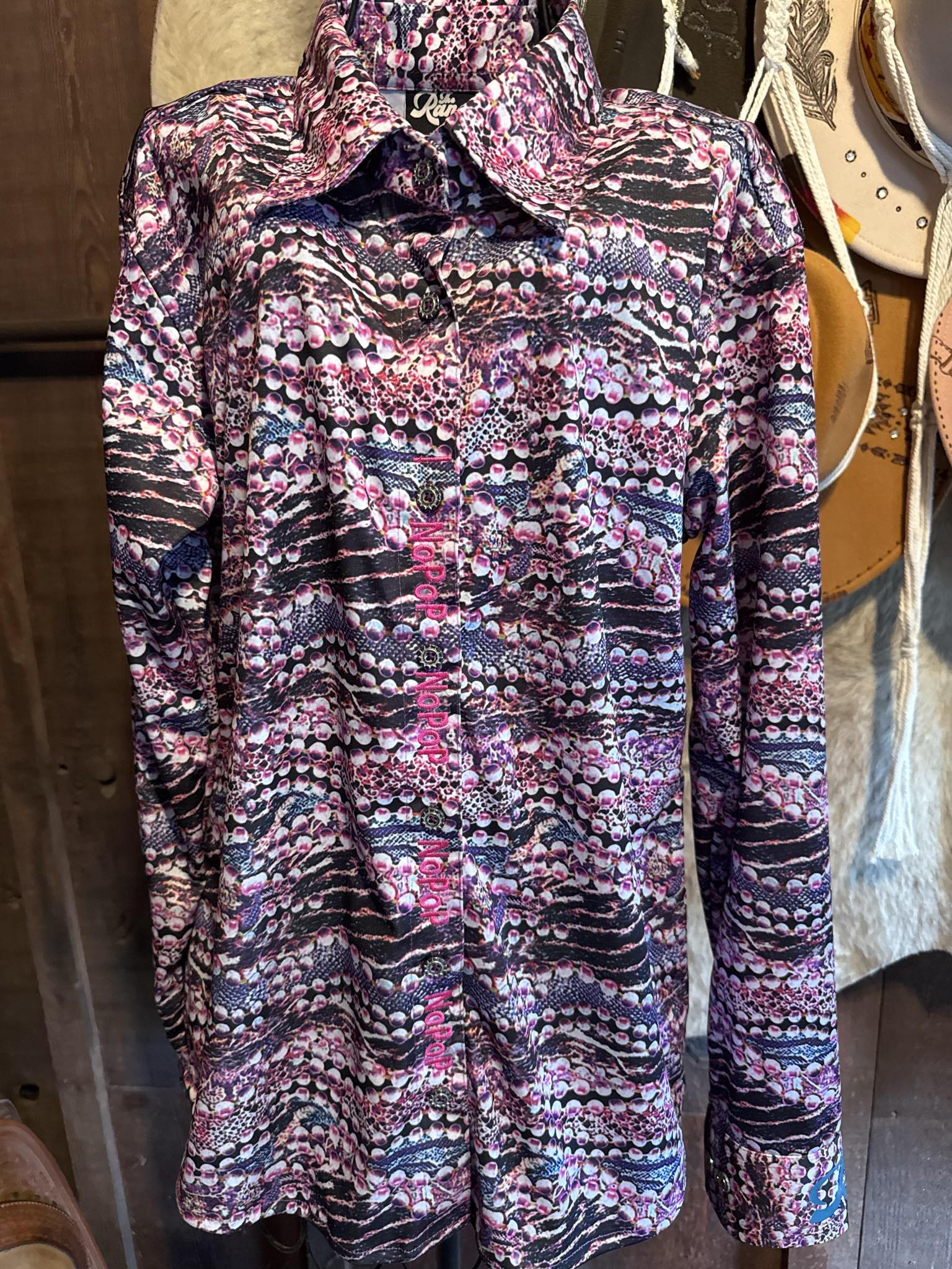 Pink, black, and white Ranch Equestrian barrel racing show shirt with NoPop closure, size small, luxury performance fabric.