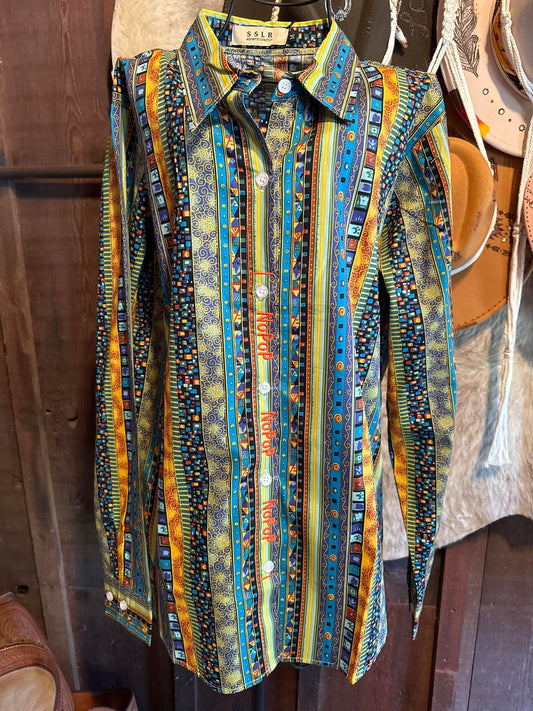 Colorful patterned barrel racing NoPop shirt in medium, featuring vibrant blue, yellow, and orange cotton fabric with secure hidden closure design.